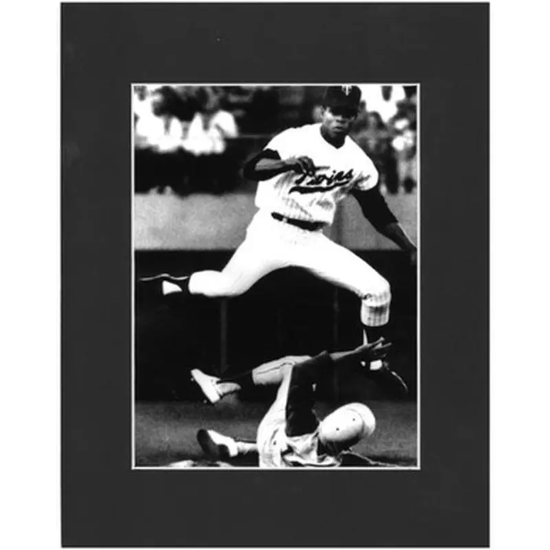 Matted 8x10 Photo- Rod Carew Throwing 