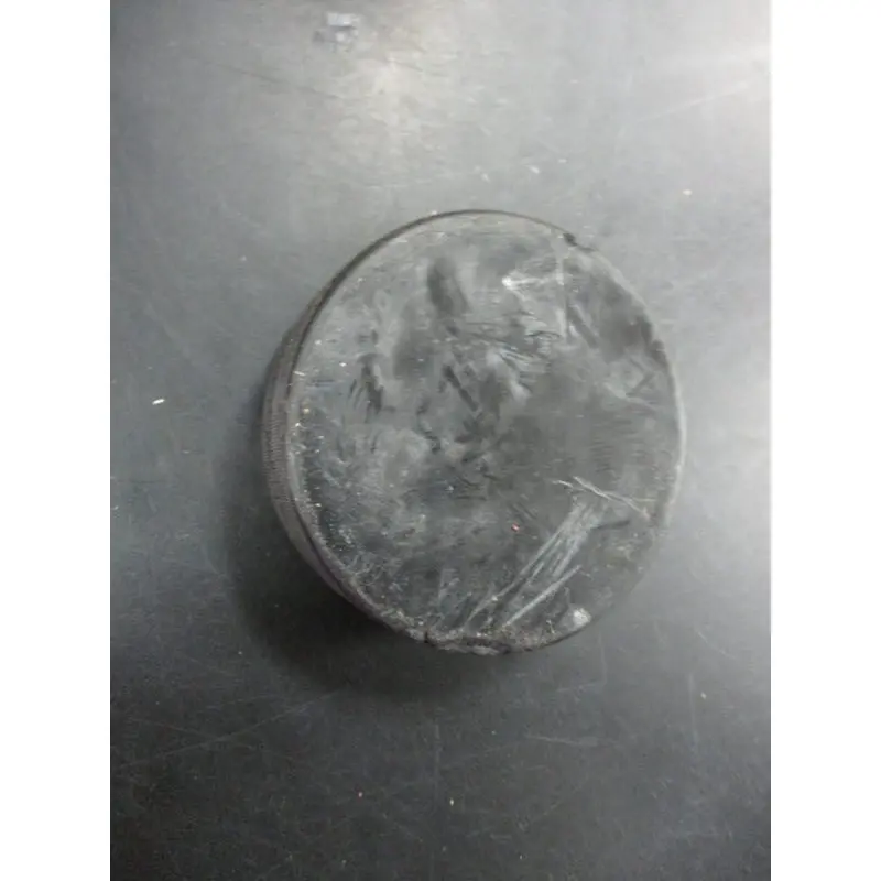 Used Black Hockey Puck